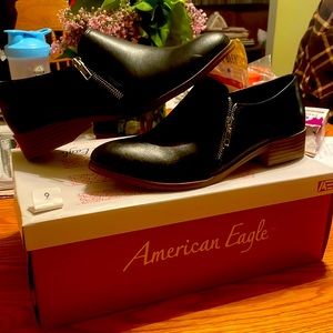 American eagle size 9 black leather zipper shoes work.  Business casual